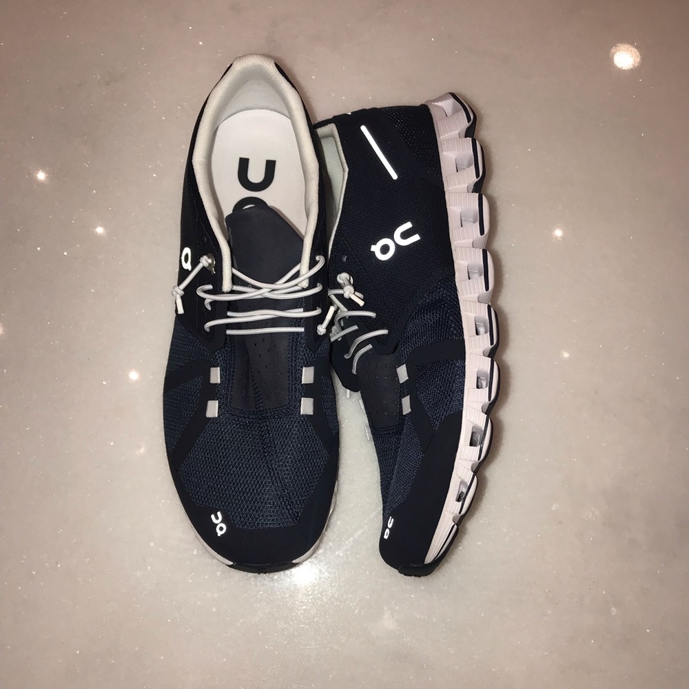 On cloud tennis shoes.